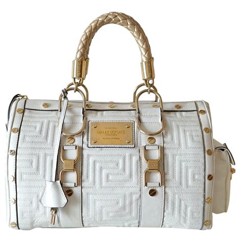 white and gold versace handbag|Versace signature bag.